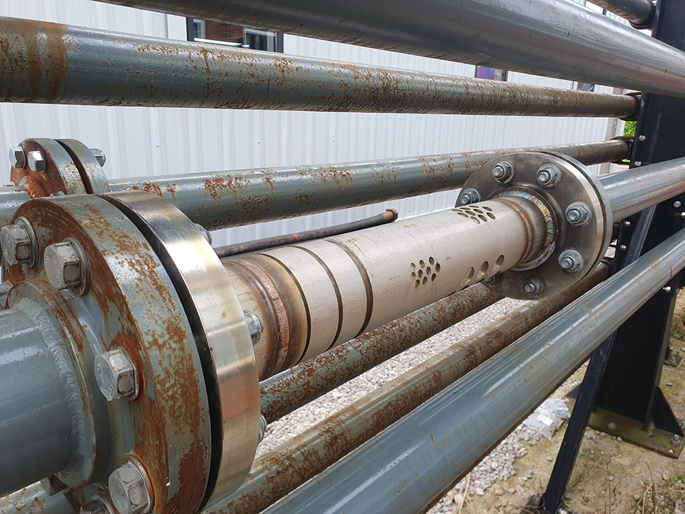 Cokebusters defect tube in-situ on test loop
