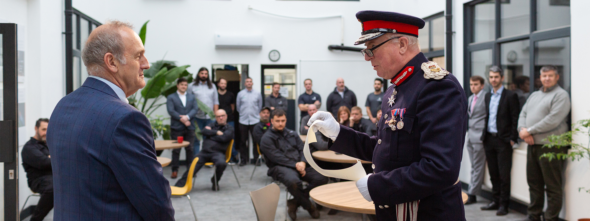 Lord-lieutenant of Clwyd presents Cokebusters Chairman with double Kings Award